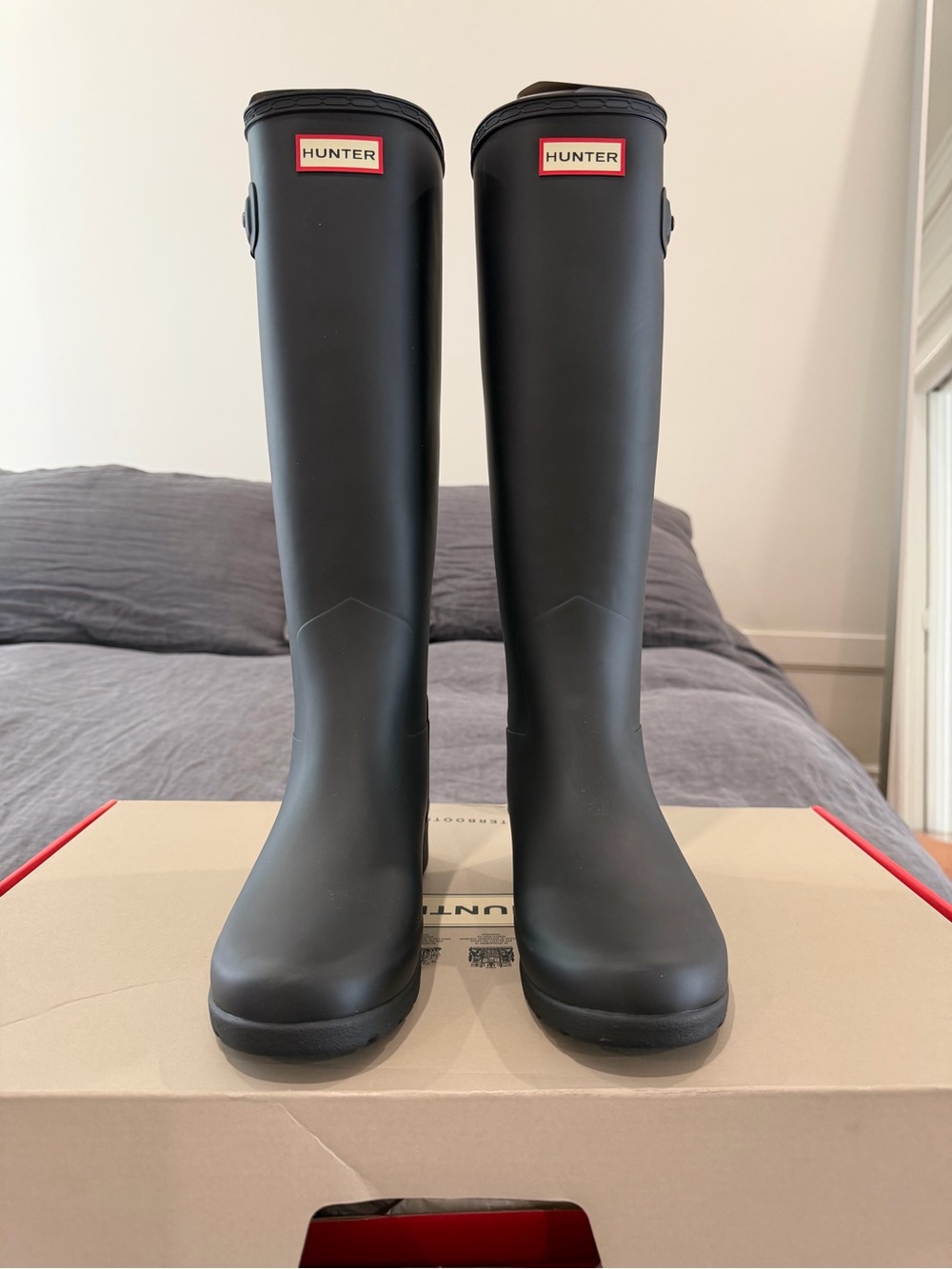 Hunter Women's Tall Waterproof Rain Boots in Black with Red Logo Accent